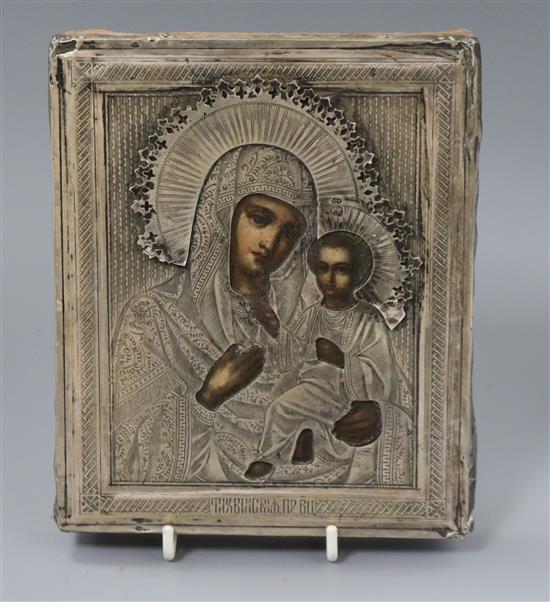 A late 19th century Russian 84 zolotnik white metal mounted icon, 17.8cm.
